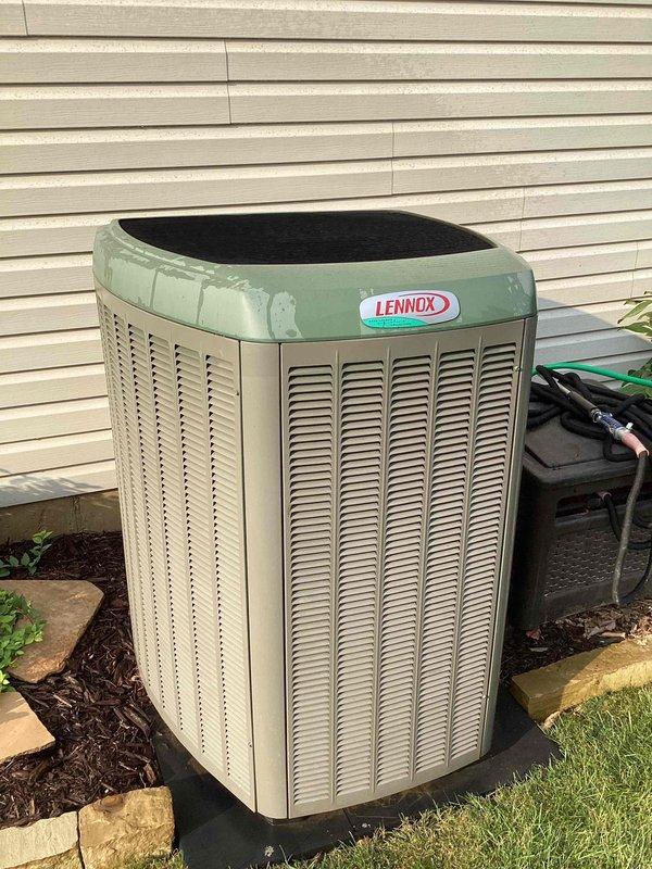 Completed comprehensive cooling tune-up on 15-year-old Lennox XP21-048 heat pump system with zoning configuration and wall-mounted damper control box. Performed standard maintenance procedures including inspection of outdoor unit, verification of refrigerant charge, electrical connections check, and system performance testing. All components found operating within normal parameters with no deficiencies noted; system returned to service in proper working condition.