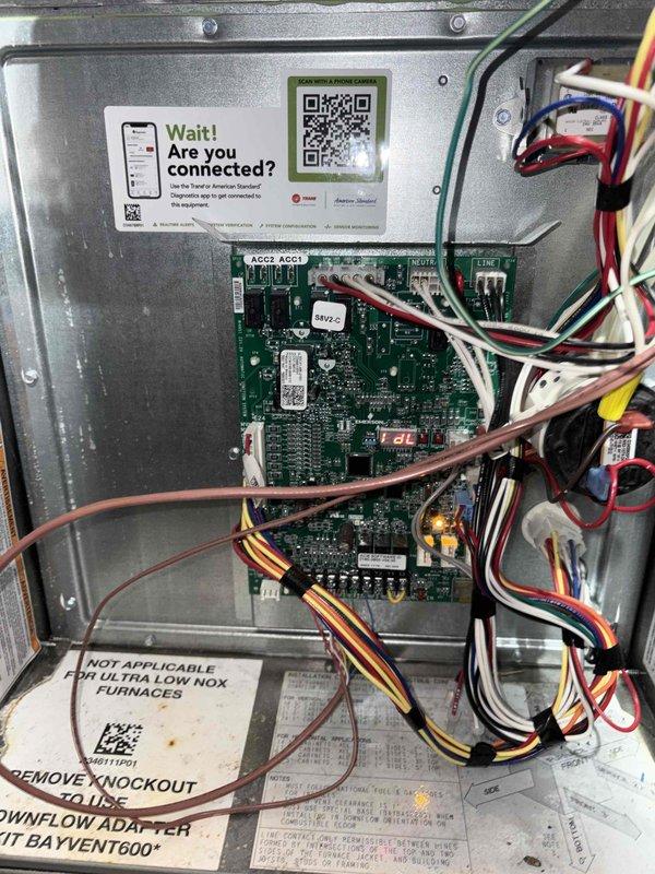 Completed comprehensive cooling system tune-up on basement-located AC unit. Inspected evaporator coil assembly and noted moderate dust and dirt accumulation on fins requiring attention during maintenance; verified control board connections and wiring harness integrity within air handler cabinet. All system components inspected and unit operational upon completion of scheduled preventive maintenance service.