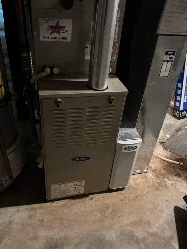Completed cooling season tune-up maintenance on single outdoor AC unit paired with Carrier furnace system. Performed comprehensive inspection of all components, checked refrigerant levels, cleaned condenser coils, verified proper airflow through existing pleated filter and Aprilaire air purification system, and confirmed all electrical connections and controls operating within manufacturer specifications.