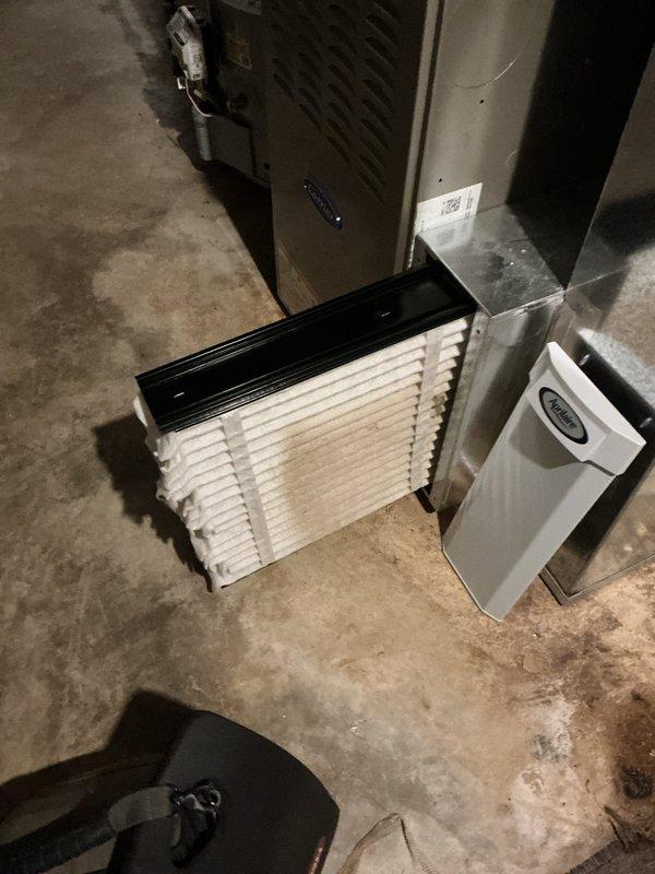 Completed cooling season tune-up maintenance on single outdoor AC unit paired with Carrier furnace system. Performed comprehensive inspection of all components, checked refrigerant levels, cleaned condenser coils, verified proper airflow through existing pleated filter and Aprilaire air purification system, and confirmed all electrical connections and controls operating within manufacturer specifications.