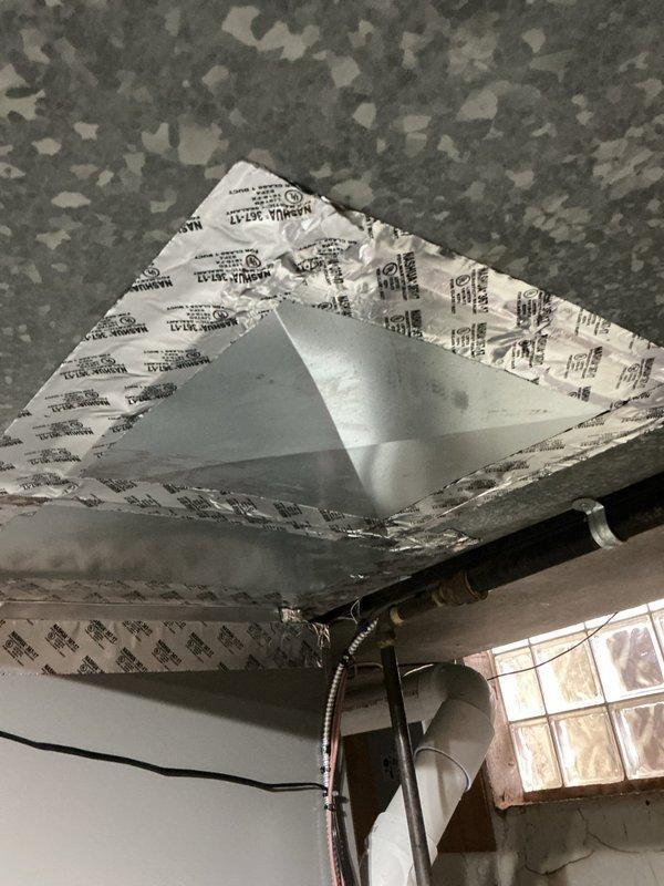 Returned to property to complete ductwork installation using supplied materials including 10" flexible duct, 10" stick-on start collar, and 3-foot panduit sections. Installed new flex duct connections to air handler unit in basement utility area, replacing damaged or collapsed ductwork sections. Secured all duct connections with proper collars and fasteners, ensuring airtight seals at junction points. Removed and disposed of old ductwork materials as specified. Verified system airflow and confirmed heating and cooling operation upon completion of ductwork modifications.