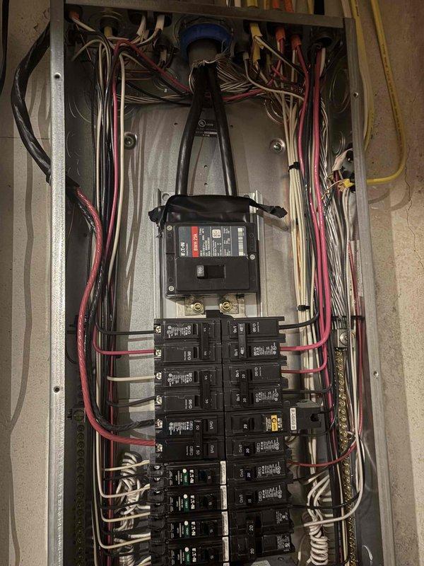 Replaced damaged 20-amp single-pole Eaton circuit breaker in main electrical panel that was broken during home inspection. The 13-year-old breaker was successfully removed and a new compatible breaker was installed, restoring proper circuit protection and functionality to the affected circuit.