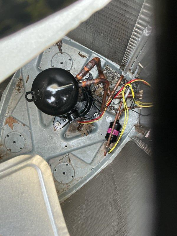 Completed compressor replacement on HVAC unit. Removed failed compressor, installed new replacement unit, reconnected refrigerant lines and electrical connections, and performed system diagnostics. Documented old and new compressor serial numbers with photographs per protocol, retained old compressor, and verified system operational parameters upon completion.