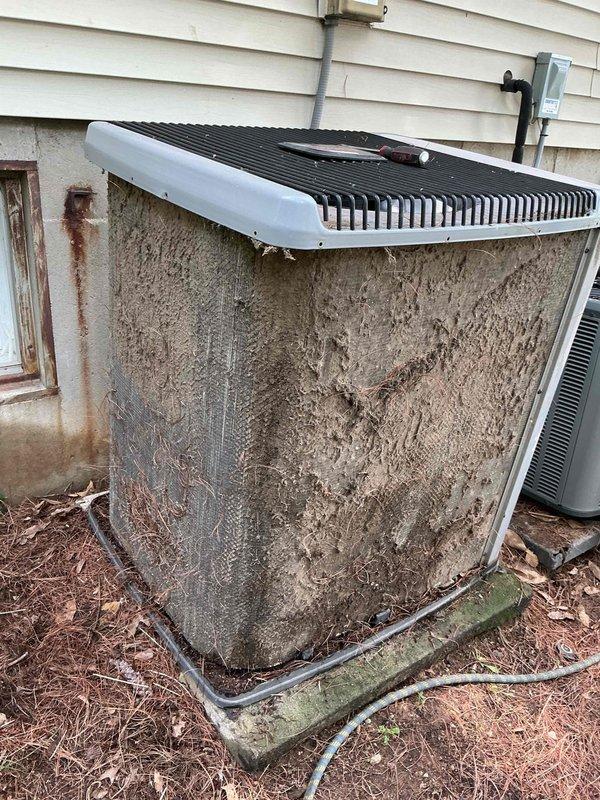 Responded to water leak from attic air handler unit. Upon arrival, customer had already shut off system as previously advised. Performed diagnostic inspection of both indoor and outdoor HVAC units. Exterior condenser units showed extensive debris accumulation on coil fins and surfaces, with heavy dirt, dust, and organic matter buildup restricting airflow. Documented equipment condition with photographs showing significant lack of preventative maintenance on both outdoor units. Identified source of attic water leak and provided recommendations for repair and ongoing system maintenance to prevent future issues.