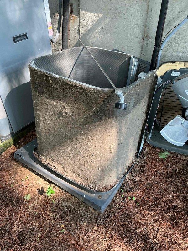 Responded to water leak from attic air handler unit. Upon arrival, customer had already shut off system as previously advised. Performed diagnostic inspection of both indoor and outdoor HVAC units. Exterior condenser units showed extensive debris accumulation on coil fins and surfaces, with heavy dirt, dust, and organic matter buildup restricting airflow. Documented equipment condition with photographs showing significant lack of preventative maintenance on both outdoor units. Identified source of attic water leak and provided recommendations for repair and ongoing system maintenance to prevent future issues.