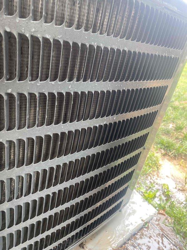 Completed cooling tune-up on single outdoor condenser unit located in side yard. Unit is under 10 years old and showed moderate accumulation of dirt and debris between coil fins. Performed standard maintenance protocol including inspection of all accessible components, cleaning of condenser coils, and verification of proper system operation.