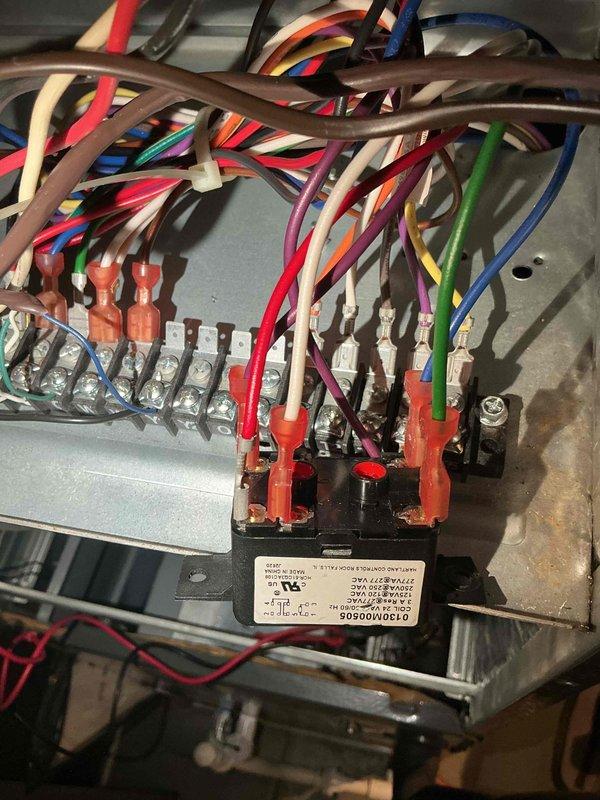 Responded to no cooling complaint on 4-year-old Lennox attic unit. Upon inspection, found corroded and deteriorated wire connections at the control board and terminal blocks, with visible rust on multiple connection points. Cleaned all corroded terminals, re-secured loose wire connections, and tested all electrical circuits for proper voltage and continuity. System restored to normal operation with proper cooling function confirmed.