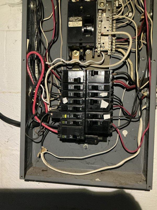 Installed Square D GFCI circuit breaker in existing residential electrical panel. Verified proper wire connections to bus bars, ensured secure terminations of hot, neutral, and ground conductors, and tested breaker functionality upon completion.