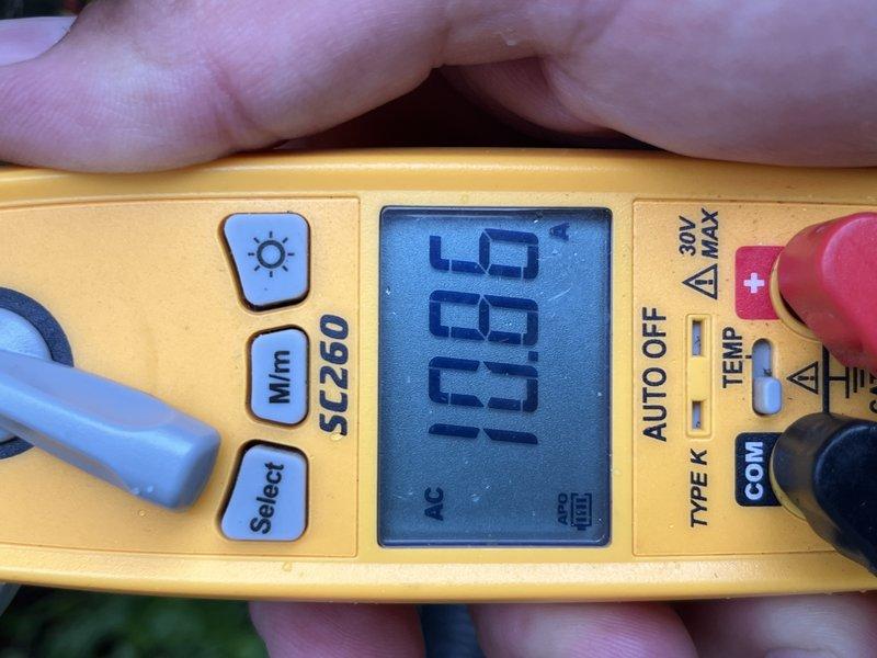 Completed comprehensive cooling system tune-up on single ground-level outdoor AC unit. Performed electrical diagnostics using digital multimeter, recording voltage readings at 100.5VAC to verify proper power supply to system. Inspected blower assembly and motor within air handler unit, confirmed all electrical connections secure, and verified centrifugal fan wheel operation and airflow performance meets manufacturer specifications.