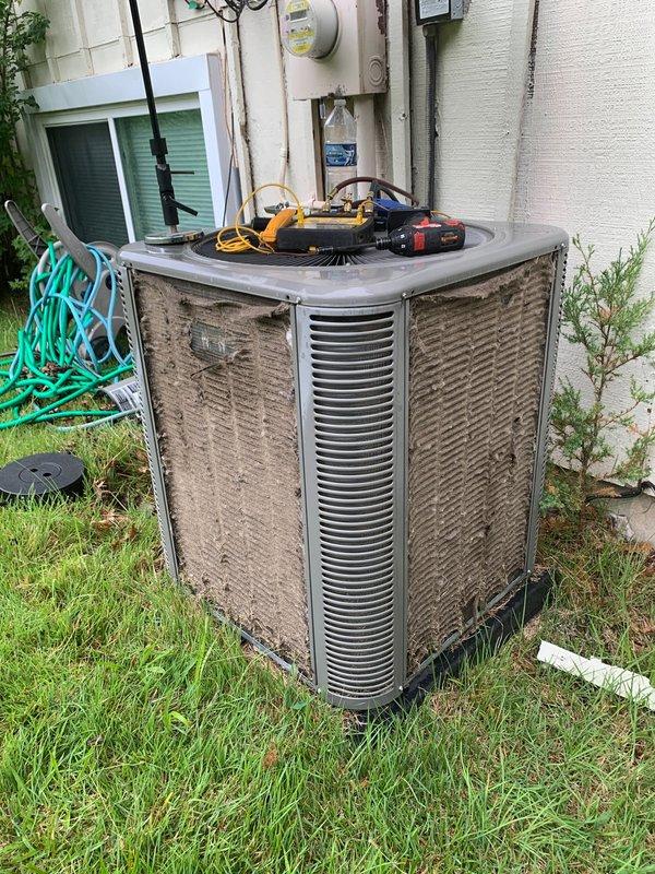 Responded to no cooling call on residential split system under 10 years old. Upon arrival, performed diagnostic testing on outdoor condenser unit and indoor Lennox furnace with cooling coil. System was completely non-operational with no power to outdoor unit. Identified failed contactor preventing compressor and condenser fan from engaging, resulting in complete loss of cooling capacity.