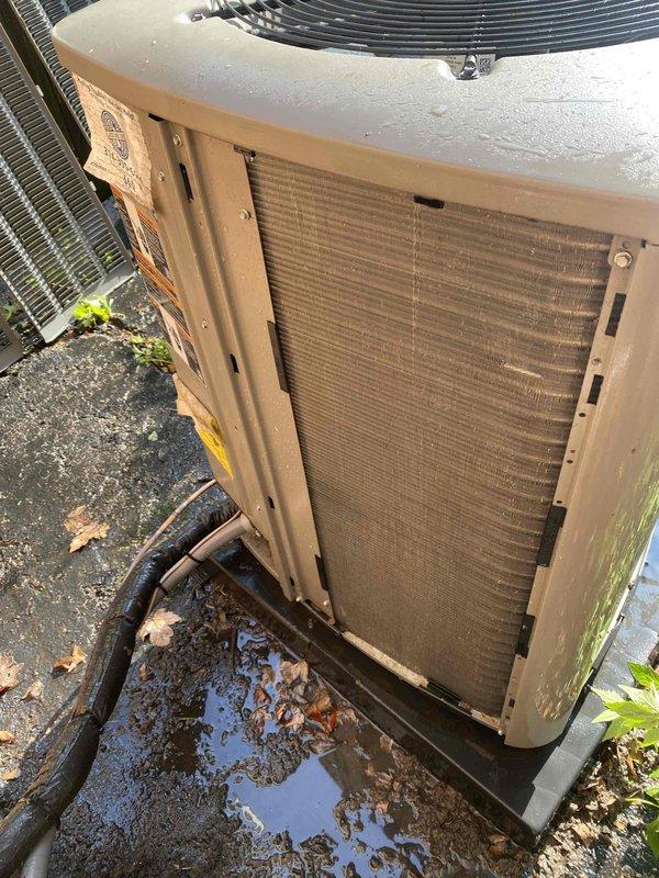 Completed comprehensive cooling tune-up on outdoor AC unit located in backyard. Upon inspection, condenser coils showed significant accumulation of dirt and debris throughout fins, requiring thorough cleaning to restore proper airflow and heat transfer efficiency. Exterior housing exhibited weathering, discoloration, and algae growth, which was addressed during service. Inspected blower wheel assembly and verified proper operation of all mechanical components. Unit returned to optimal operating condition following maintenance procedures.