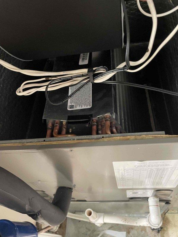 Replaced defective evaporator coil in air handler unit located in crawl space. Removed old coil, installed new replacement coil with model number 1717k21601, and properly connected refrigerant lines. Verified system operation for both heating and cooling functions upon completion, with unit now operating within manufacturer specifications.