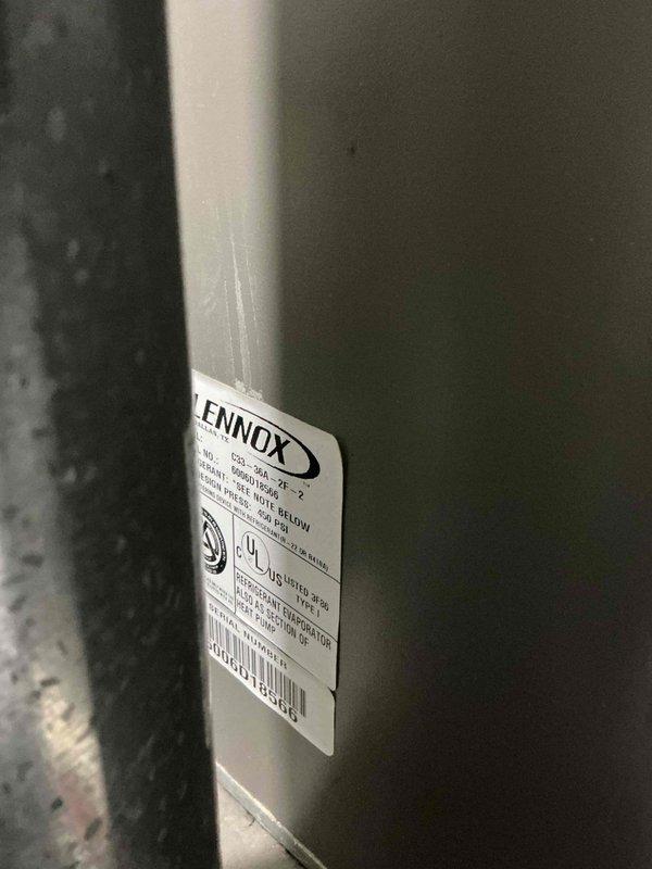 Responded to no cooling complaint on 10+ year old Lennox residential air conditioning system. Upon arrival, confirmed indoor temperature at 90 degrees with outdoor condenser fan motor inoperative. Diagnosed failed condenser fan motor preventing heat rejection from refrigeration cycle. Accessed condenser unit, tested electrical components, and replaced defective fan motor to restore proper system operation and cooling capacity.