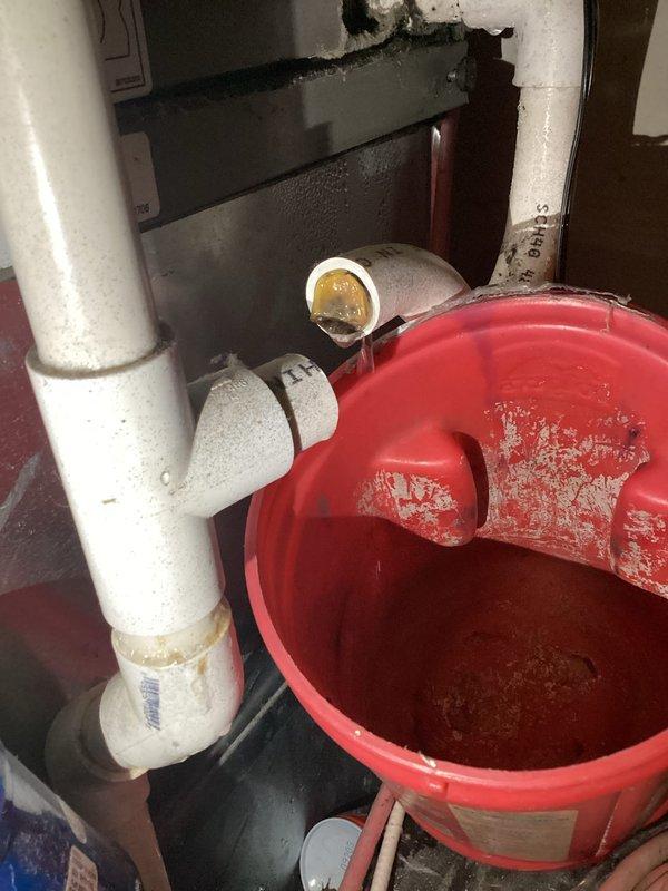 Responded to no cooling complaint on 12-year-old residential air conditioning system. Upon arrival, utilized digital manifold gauges to diagnose system performance and measure refrigerant pressures and temperatures. Testing revealed issues requiring attention to the condensate drainage system. Addressed condensate line concerns by clearing blockage and ensuring proper drainage flow, positioning collection bucket to manage water removal during service. System evaluated for proper operation following repairs to restore cooling capacity to the home.