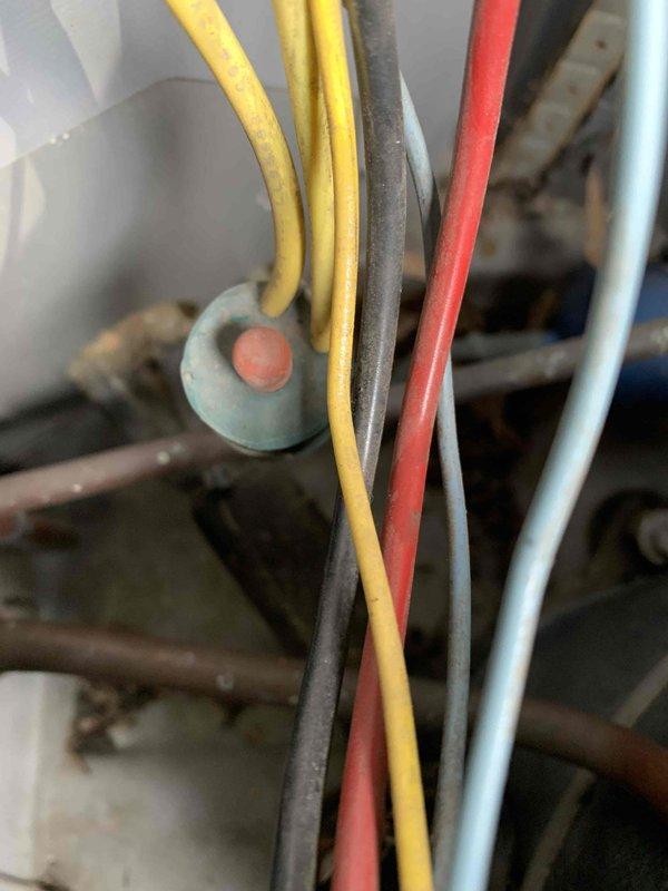 Responded to no-cool complaint on residential HVAC system. Upon inspection, discovered severely clogged evaporator coil with heavy dust and debris accumulation restricting airflow and preventing proper heat exchange. Removed access panel, documented extent of contamination, and inspected electrical connections and wiring which appeared intact. System failure attributed to lack of regular maintenance resulting in complete airflow blockage at the indoor coil assembly.