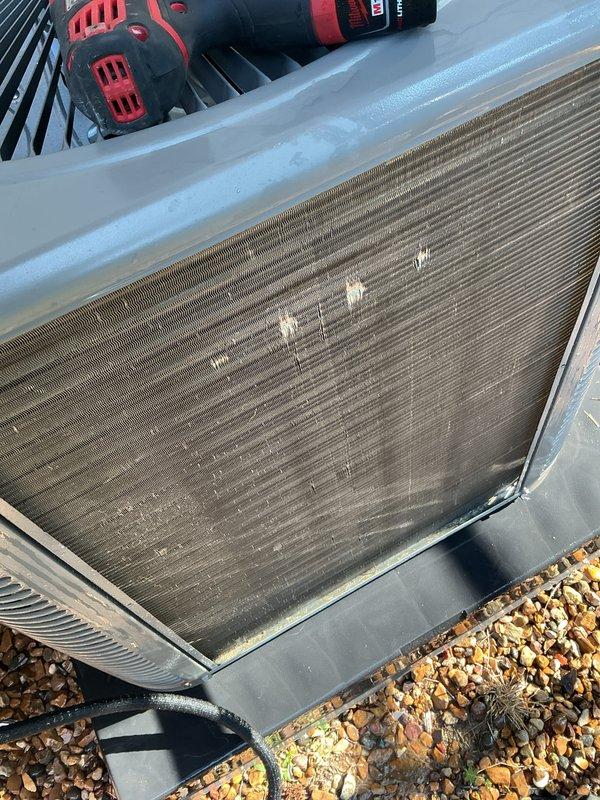 Completed cooling tune-up on 3-year-old outdoor AC unit. Performed standard maintenance inspection, checked condenser coil condition showing moderate dirt accumulation on fins, and inspected air filtration system with Koch brand pleated filters in place. All components operational and system running within normal parameters.