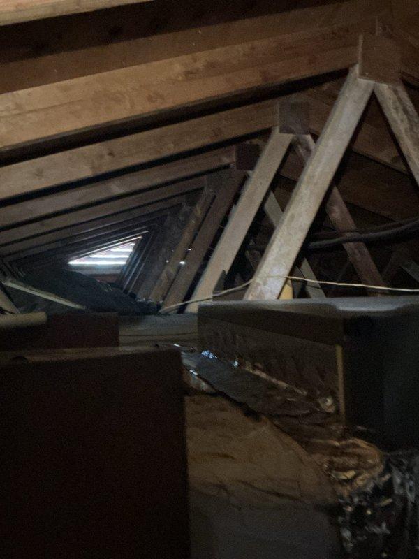 Conducted initial site assessment for electrical wiring installation to support heating system addition for top floor HVAC unit. Inspected attic space accessibility and existing electrical panel capacity to determine feasibility and requirements for the proposed electrical work.