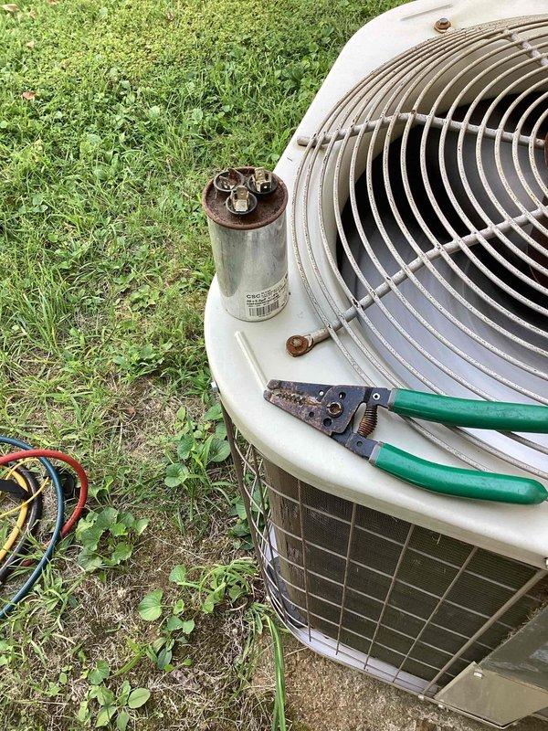 Responded to no cooling call on 10+ year old residential unit located in side yard. Upon arrival, found outdoor condenser unit not operating. Diagnosed failed capacitor preventing compressor and condenser fan motor from starting. Replaced defective capacitor with new unit, restoring proper operation to cooling system. Verified system startup, confirmed compressor engagement, and measured supply air temperature at 57.8°F, indicating adequate cooling performance. Unit operating within normal parameters at time of departure.
