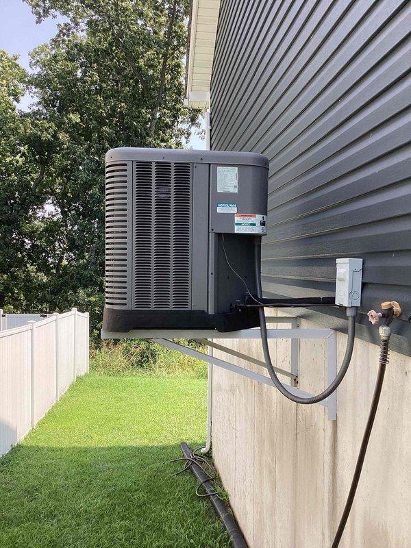 Responded to no cooling call where system was blowing warm air and producing low humming noise. Upon arrival, found Nest thermostat set to cooling mode at 70°F but unit not providing adequate cooling. Inspected outdoor condenser unit and identified low refrigerant charge as primary issue. Advised customer to keep system off until repairs could be completed to prevent compressor damage from continued operation under low refrigerant conditions.