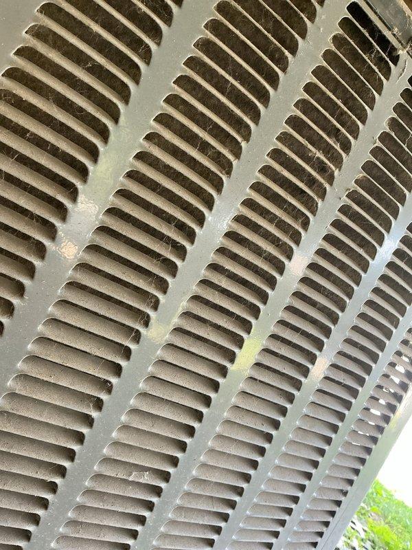 Responded to no cooling complaint on outdoor unit U10. Upon arrival, confirmed air handler fan operational but system not producing cold air. Inspected evaporator coil and found significant dirt and debris accumulation restricting airflow through fins. Coil showed no signs of freezing or frost formation as initially reported. Documented coil condition with photos showing heavy dust buildup in corrugated fin sections. Cleaned evaporator coil thoroughly to restore proper heat exchange and airflow. Verified system operation after cleaning, with unit now cooling properly and achieving target temperatures.
