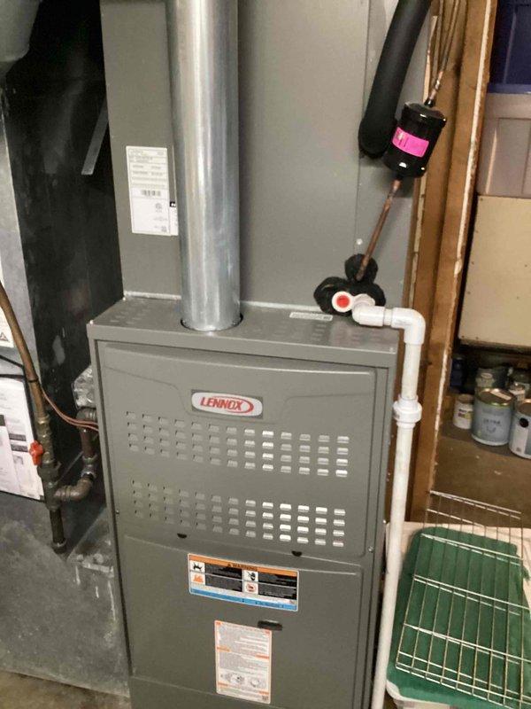 Responded to service call for excessive condensation on AC pipes in basement. Upon inspection, found unit operating with improper airflow settings. Adjusted thermostat to continuous fan operation as requested and verified proper system cycling. Inspected condensate drainage system and confirmed all lines were clear and functioning properly. Observed furnace and water heater in immediate vicinity showing age-related wear but not contributing to condensation issue. Condensation on refrigerant lines was consistent with high humidity conditions and normal system operation. Educated homeowner on expected condensation levels during cooling season and confirmed system was operating within normal parameters.