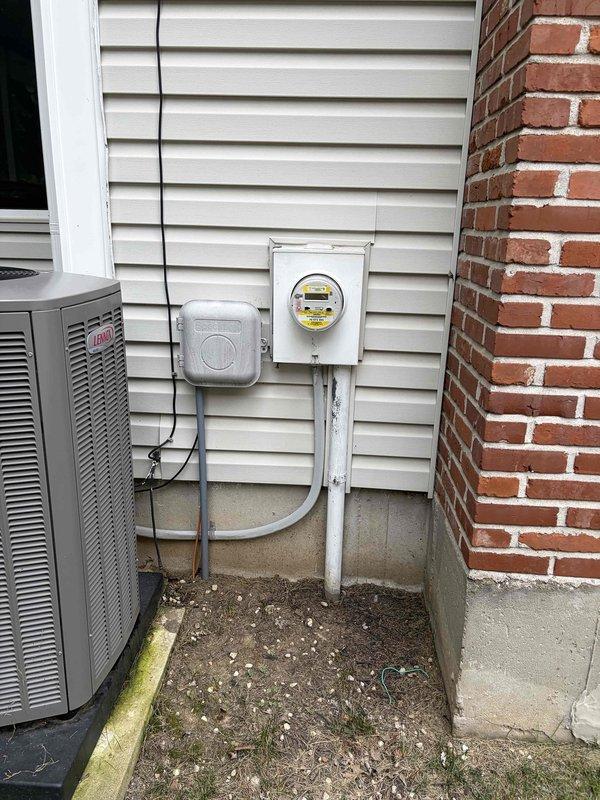 Completed comprehensive electrical inspection of residential service entrance and main distribution panel. Examined exterior meter installation, weatherproof disconnect box, and associated conduit connections serving the property, verifying proper installation and grounding of all exterior electrical components including HVAC equipment connections. Inspected interior main electrical panel, evaluating all circuit breakers, conductor terminations, wire routing, and panel box integrity to ensure compliance with electrical code requirements and safe operation of the electrical system.
