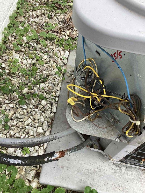 Responded to no cooling call on 10+ year old residential AC system. Upon arrival, found outdoor condensing unit with failed dual run capacitor preventing compressor operation. Verified unit had been turned off with fan left running per dispatch instructions to prevent further damage. Inspected electrical components in outdoor unit and confirmed capacitor failure through visual inspection and electrical testing. Replaced defective capacitor with properly rated component, restored power to system, and verified compressor startup and proper amperage draw. Checked refrigerant pressures, confirmed adequate charge, and monitored system through complete cooling cycle. Unit cooling properly at departure with all components operating within manufacturer specifications.