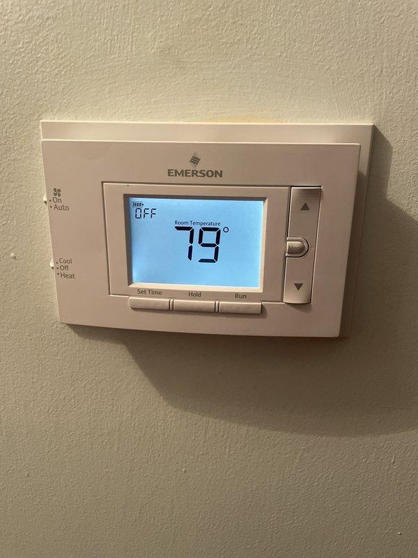 Responded to no cooling call on 3-year-old system. Upon arrival, found Emerson thermostat displaying 79°F room temperature with system in min OFF mode. Inspected air handler unit in basement mechanical room and verified all equipment connections, refrigerant lines, and ductwork. Advised customer to shut off humidifier per seasonal recommendation. System evaluated and customer provided with findings and recommendations for restoring cooling operation.