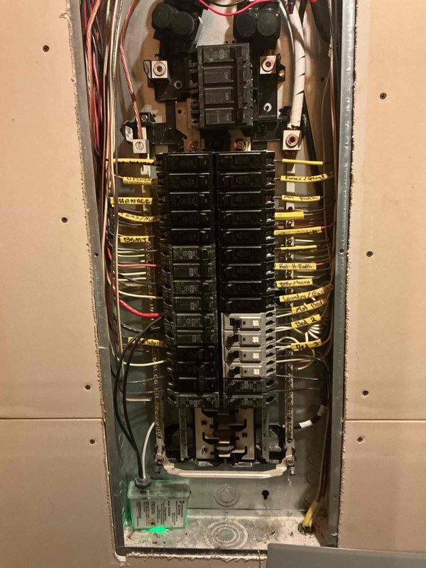 Responded to reported issue of two upstairs lights not functioning after bulb replacement. Inspected electrical panel and circuit breakers to diagnose potential breaker malfunction affecting upstairs lighting circuits. Additionally, installed ceiling fan as requested to complete fixture upgrades.