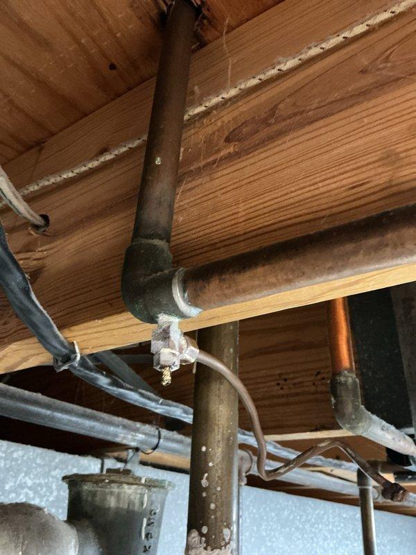 Responded to callback for leaking humidifier water line on basement unit. Upon inspection, identified failed connection at humidifier supply line causing active leak. Replaced defective compression fitting and secured water line connections. Verified humidifier operation and confirmed no further leakage present. System tested and returned to normal operation.