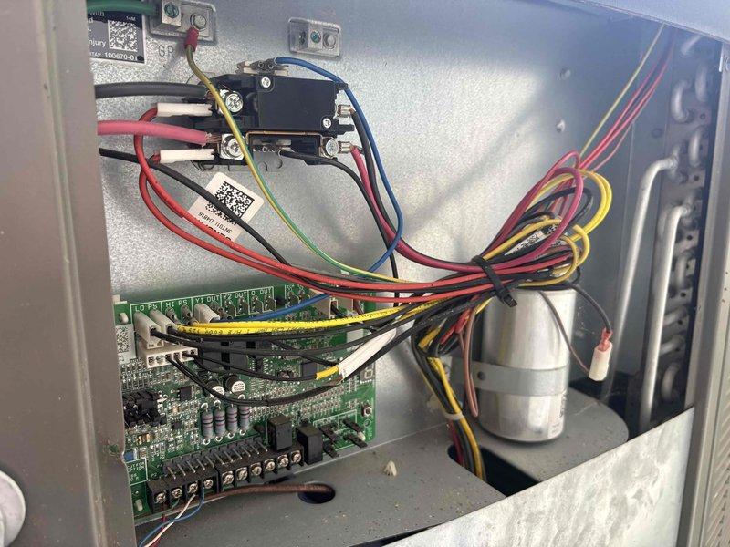 Responded to no cooling call on 8-year-old air conditioning system. Upon arrival, confirmed system was completely non-operational. Accessed control panel and inspected electrical components, circuit boards, and wiring harness. Identified failed control board preventing system operation. Replaced defective PCB with new circuit board, verified all electrical connections, and tested relay operation. Restored power to unit and confirmed proper system startup and cooling operation. System now functioning normally with all safety controls operational.