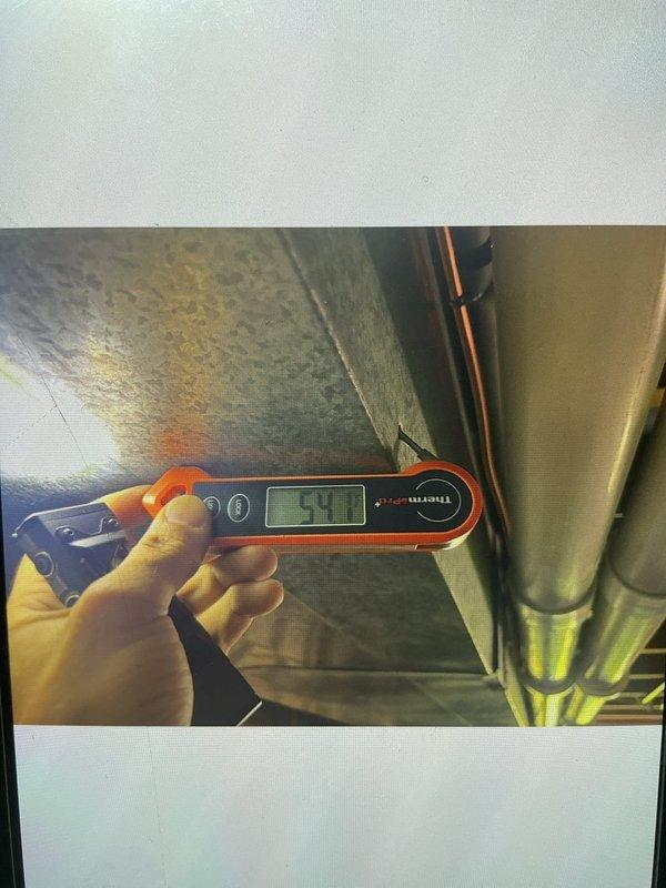 Responded to cooling deficiency complaint on 10-year-old ground-level unit. Upon inspection, found evaporator coil heavily contaminated with dirt, dust, and debris accumulation, significantly restricting airflow and reducing system efficiency. Measured supply air temperature at 49.1°F at register, confirming inadequate cooling performance. Documented coil condition and recommended thorough coil cleaning to restore proper airflow and system capacity.