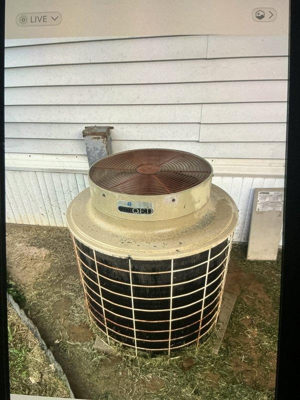 Responded to no cooling call where indoor temperature had risen to 90 degrees while outdoor unit was running. Upon inspection and testing of the outdoor condenser unit, diagnosed failed run capacitor using digital multimeter which confirmed capacitor was out of specification. Replaced defective capacitor with new TITAN PRO unit, restored system to proper operation, and verified cooling cycle resumed normally with air handler and condenser functioning correctly.