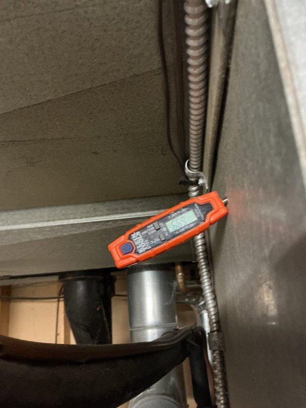 Responded to no cooling complaint for upstairs unit 10 located in backyard. Upon arrival, performed diagnostic evaluation and found condenser coils heavily soiled with dirt and debris accumulation, restricting airflow and reducing heat transfer efficiency. Measured system temperatures and pressures using digital manifold gauges, confirming reduced cooling capacity due to dirty coil condition. Condensate drain system was also inspected at indoor air handler. Recommended thorough coil cleaning and system maintenance to restore proper cooling operation for upstairs zone.