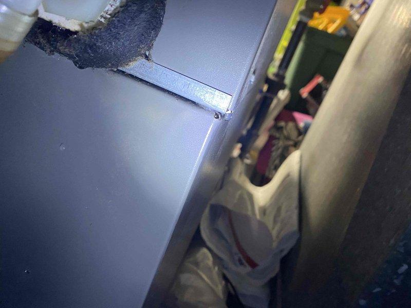 Responded to no-cool service call on 16-year-old residential air conditioning system experiencing active water leakage from indoor unit. Upon arrival, performed diagnostic inspection of air handler and discovered clogged condensate drain line causing overflow and water discharge at base of unit. Cleared blockage from drain line using appropriate tools and verified proper drainage flow. Inspected evaporator coil and drain pan for damage or secondary issues; found drain pan intact but noted accumulation of algae and debris contributing to blockage. Flushed condensate system thoroughly and treated drain line to prevent future biological growth. Tested system operation through complete cooling cycle to confirm proper condensate removal and verified no further leakage present. System restored to normal cooling operation with proper drainage function.