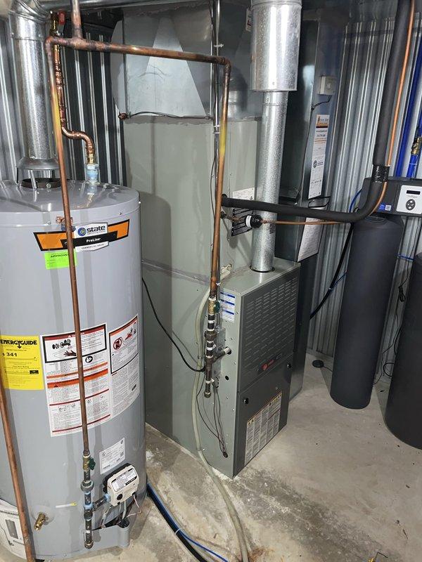 Responded to no cooling complaint on 8-year-old Trane system with thermostat locked at 78°F and no airflow from downstairs vents. Upon inspection, found outdoor unit's dual run capacitor had failed, preventing compressor and condenser fan operation. Replaced defective capacitor, tested contactor operation, and verified all electrical connections in outdoor unit's control compartment. Cycled system through complete cooling cycle, confirmed proper compressor amperage draw, verified adequate airflow at all registers, and restored cooling operation with thermostat responding correctly to temperature setpoints.
