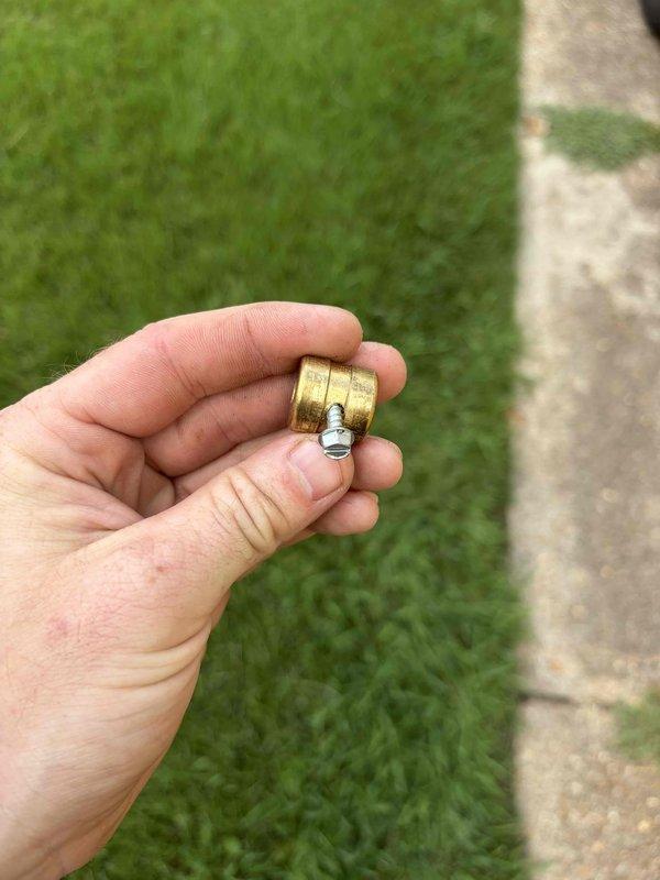 Responded to no cooling complaint on 10+ year old AC unit with weak airflow. Upon inspection, discovered compromised ductwork connections and loose fittings affecting system performance. Removed and replaced deteriorated brass connector fitting that was causing air leakage in the system. Inspected insulated ductwork assembly and framework components for proper sealing and structural integrity. Secured all connections and verified airflow restoration throughout the system.