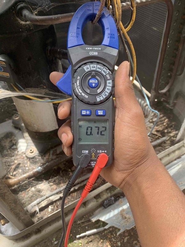 Completed routine cooling system tune-up with no specific issues reported by customer. Performed comprehensive inspection of AC unit including electrical connections, control wiring, and compressor operation. Measured system amperage at 0.72 amps using clamp meter to verify proper electrical draw and confirm compressor is operating within normal parameters.