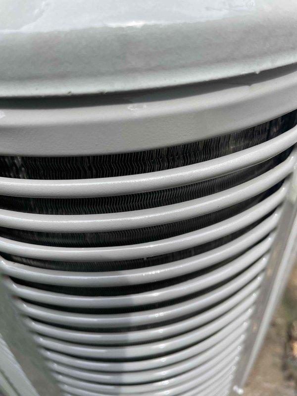 Completed comprehensive Supertune maintenance on 13-year-old Lennox 13ACX 030 condensing unit. Performed full system inspection including electrical connections, refrigerant pressures, and amperage draws. Cleaned condenser coil, checked fan motor operation and blade condition, verified proper airflow through louvers, and inspected unit mounting on concrete pad. All components found operating within manufacturer specifications with no deficiencies noted. System running efficiently with normal wear consistent with age of equipment.