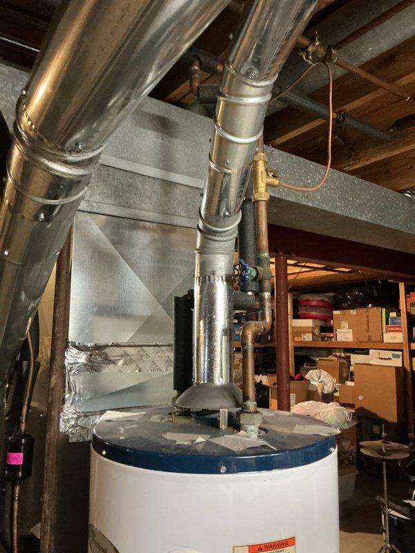 Replaced a non-functional 20+ year old gas water heater with a new 40-gallon gas tall unit, including installation of a new expansion tank and 3/4" pressure reducing valve (PRV). All copper piping connections were completed to code, with proper venting installed, and work was performed under city permit requirements.