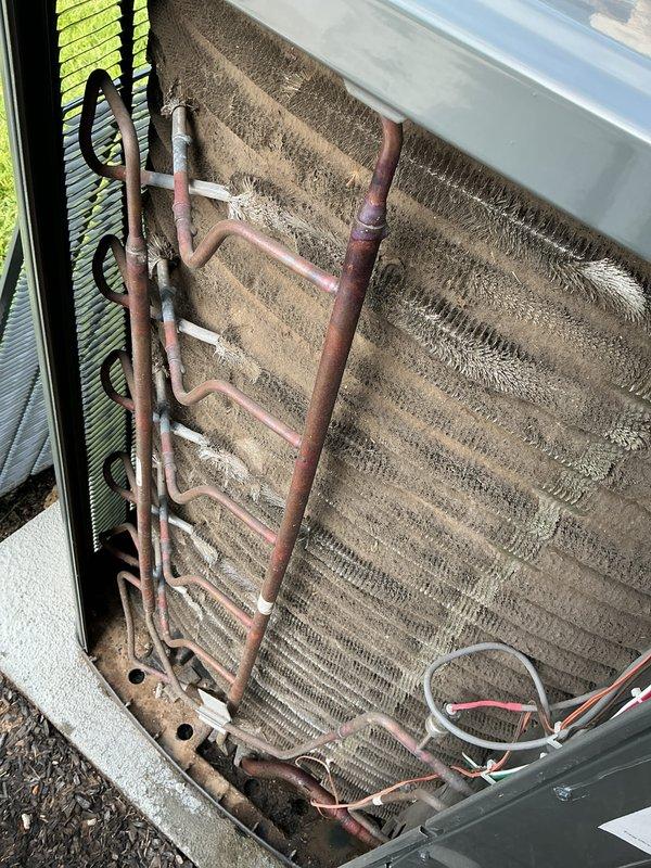 Completed preventative maintenance tune-up on a 3-year-old air conditioning unit. Inspected and documented the condition of the pleated air filter, which showed moderate dust accumulation but remained serviceable. Accessed the outdoor condenser unit and examined the evaporator coil, noting dust and debris buildup on the aluminum fins and oxidation on the copper refrigerant lines consistent with normal aging. Verified electrical connections and wiring integrity throughout the system. Unit operational upon completion of inspection.