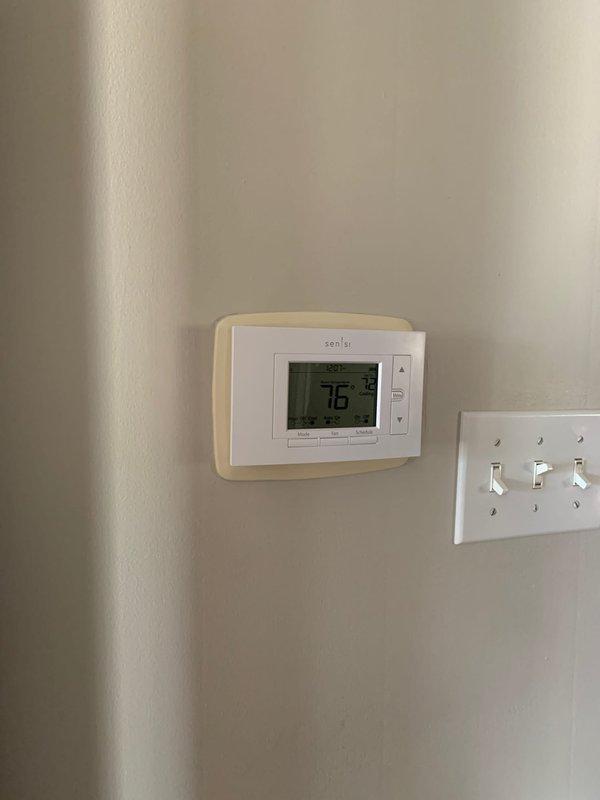 Responded to no cool call and found 11-year-old White Rodgers 1F85-0477 thermostat inoperative. Removed failed thermostat from wall and installed new Sensi digital thermostat as replacement. Verified new thermostat powered on properly, displaying 76°F ambient temperature and functioning correctly with all controls operational. System restored to normal operation.