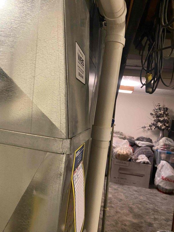 Installed a 2" PVC coupler with drain adapter to the HVAC system's condensate drain line. The repair addressed drainage issues and ensures proper condensate removal from the air handler unit. System tested and confirmed operational for both heating and cooling modes.