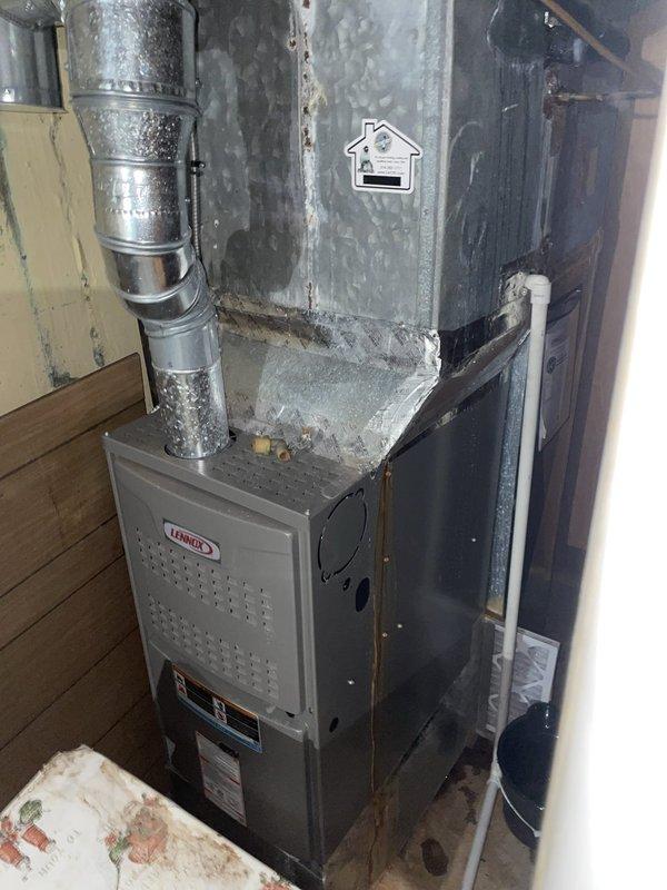 Responded to no-cool complaint on 4-year-old Lennox system with thermostat reading 76°F. Upon inspection, discovered evaporator coil completely frozen with heavy ice accumulation on refrigerant lines and coil surface. Identified restricted airflow as root cause due to severely clogged air filter. Shut down system to allow coil to thaw completely, replaced air filter, and verified proper airflow restoration. After thaw cycle completion, restarted system and confirmed normal operation with proper cooling, adequate airflow across evaporator coil, and appropriate temperature differential. Educated on importance of regular filter maintenance to prevent future freeze-ups and ensure optimal system performance.