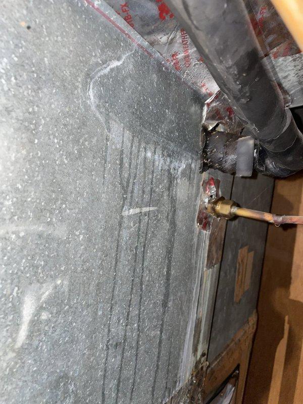 Responded to no-cool complaint on 4-year-old Lennox system with thermostat reading 76°F. Upon inspection, discovered evaporator coil completely frozen with heavy ice accumulation on refrigerant lines and coil surface. Identified restricted airflow as root cause due to severely clogged air filter. Shut down system to allow coil to thaw completely, replaced air filter, and verified proper airflow restoration. After thaw cycle completion, restarted system and confirmed normal operation with proper cooling, adequate airflow across evaporator coil, and appropriate temperature differential. Educated on importance of regular filter maintenance to prevent future freeze-ups and ensure optimal system performance.