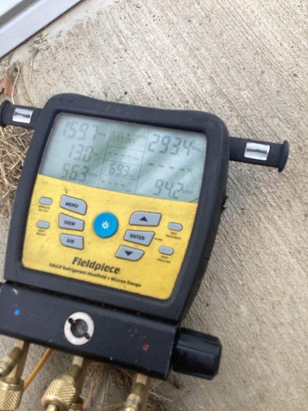 Responded to no cooling complaint on 2-year-old residential air conditioning system. Upon arrival, performed diagnostic assessment using digital manifold gauges to check refrigerant pressures and system operation. Evaluated both indoor air handler and outdoor condensing unit, verified system parameters, and identified the root cause of inadequate cooling. Completed necessary repairs to restore proper system function and confirmed unit was operating within manufacturer specifications before departure.