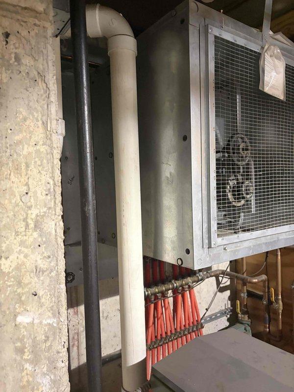 Conducted site assessment for exhaust fan replacement in garage area. Inspected existing ventilation system and HVAC components to determine scope of work and compatibility requirements. Photographed current installation including mechanical components, ductwork, and electrical service panel to prepare comprehensive bid for customer review.
