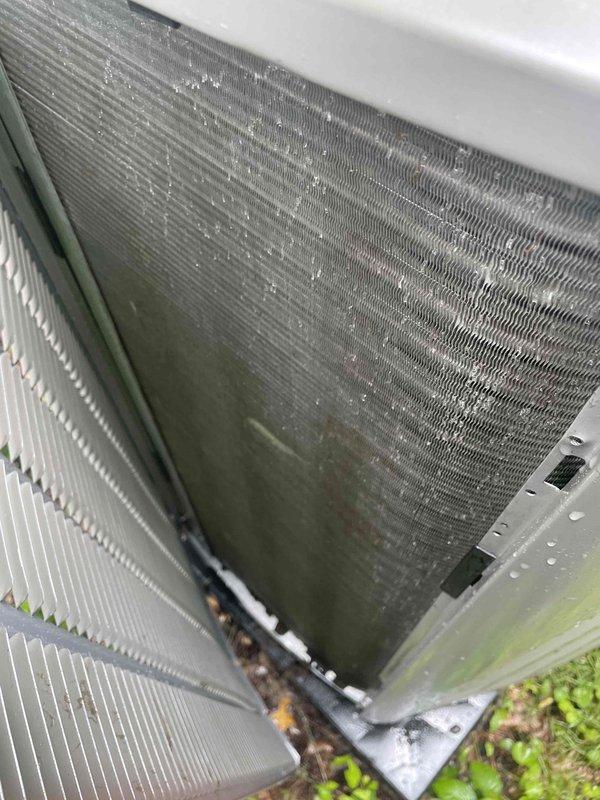 Performed comprehensive cooling season tune-up on 1-year-old Lennox condensing unit (Model CK40CT-48B-71, S/N 1525B40066). Completed full system inspection including condenser coil evaluation, which showed moderate accumulation of dirt and debris between aluminum fins requiring attention during next maintenance cycle. All system components operating within manufacturer specifications with no deficiencies noted at time of service.