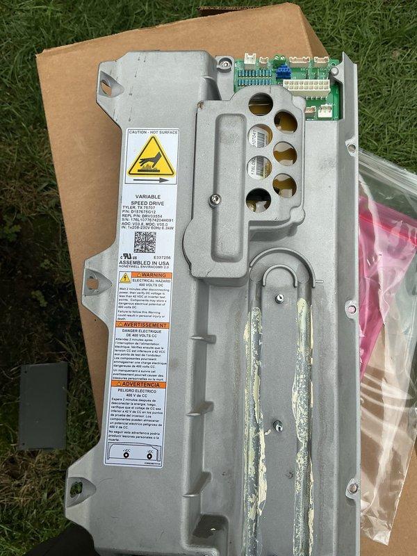 Coordinated with Trane technical support to obtain warranty claim number for failed variable speed drive. Successfully replaced defective variable speed drive unit, compressor, and suction line sensor on HVAC system. Removed failed drive showing signs of wear and corrosion on housing components. Installed new replacement drive and associated components per manufacturer specifications. Retained failed drive unit for warranty processing. System tested and operational upon completion of repairs.