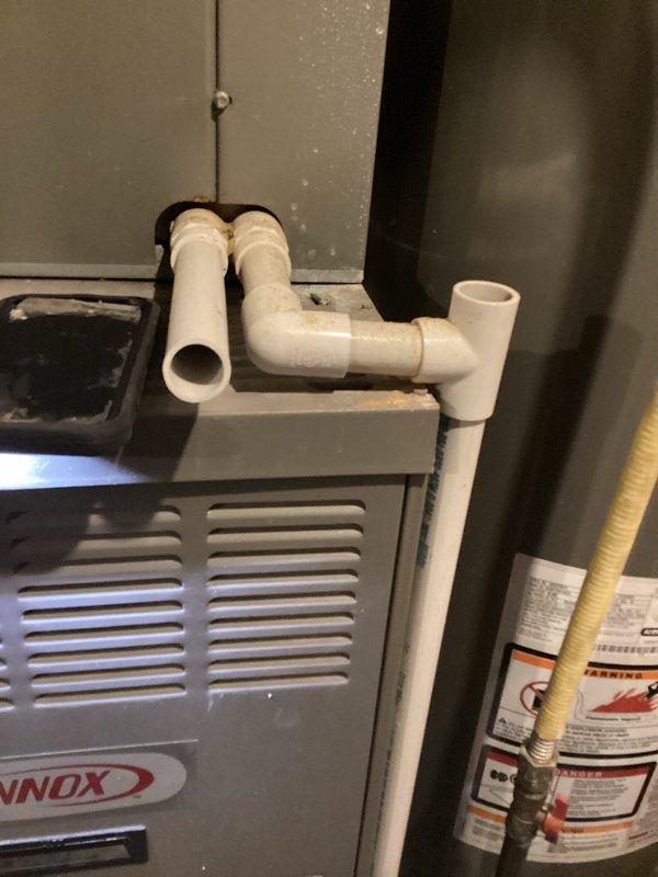 Completed comprehensive cooling maintenance tune-up on 16-year-old Lennox AC system that was operating properly at time of service. Performed standard preventive maintenance procedures including system inspection, filter evaluation, and equipment assessment. Inspected condensate drain line configuration and verified proper PVC drainage system operation. System found to be functioning within normal parameters upon completion of maintenance service.